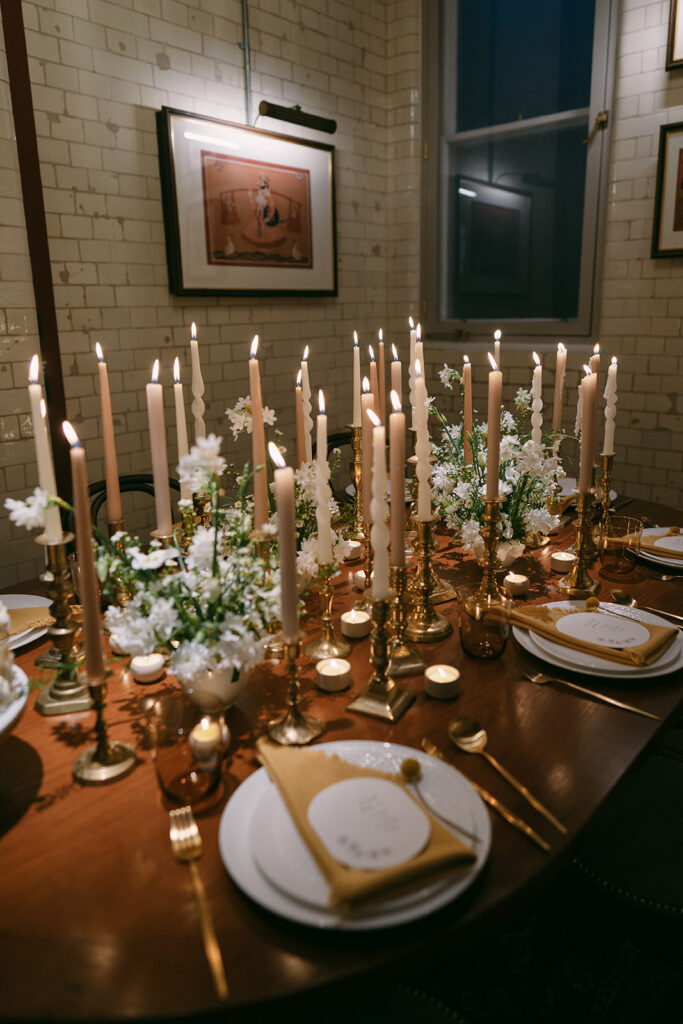 Autumnal editorial styled shoot with table set up and lots of candles