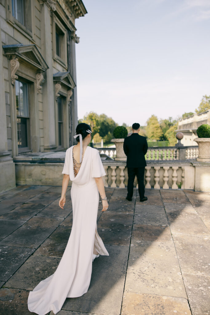 Bride walking up to the groom at Cliveden House