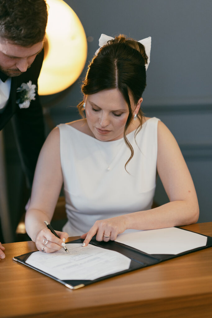 bride and groom getting married in the Knightsbridge Room at the Old Marylebone Town Hall